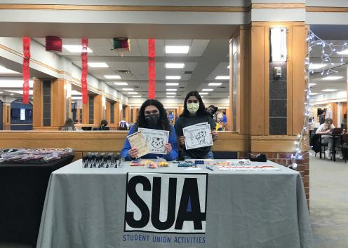 SUA members tabling with educational materials about Lunar New Year